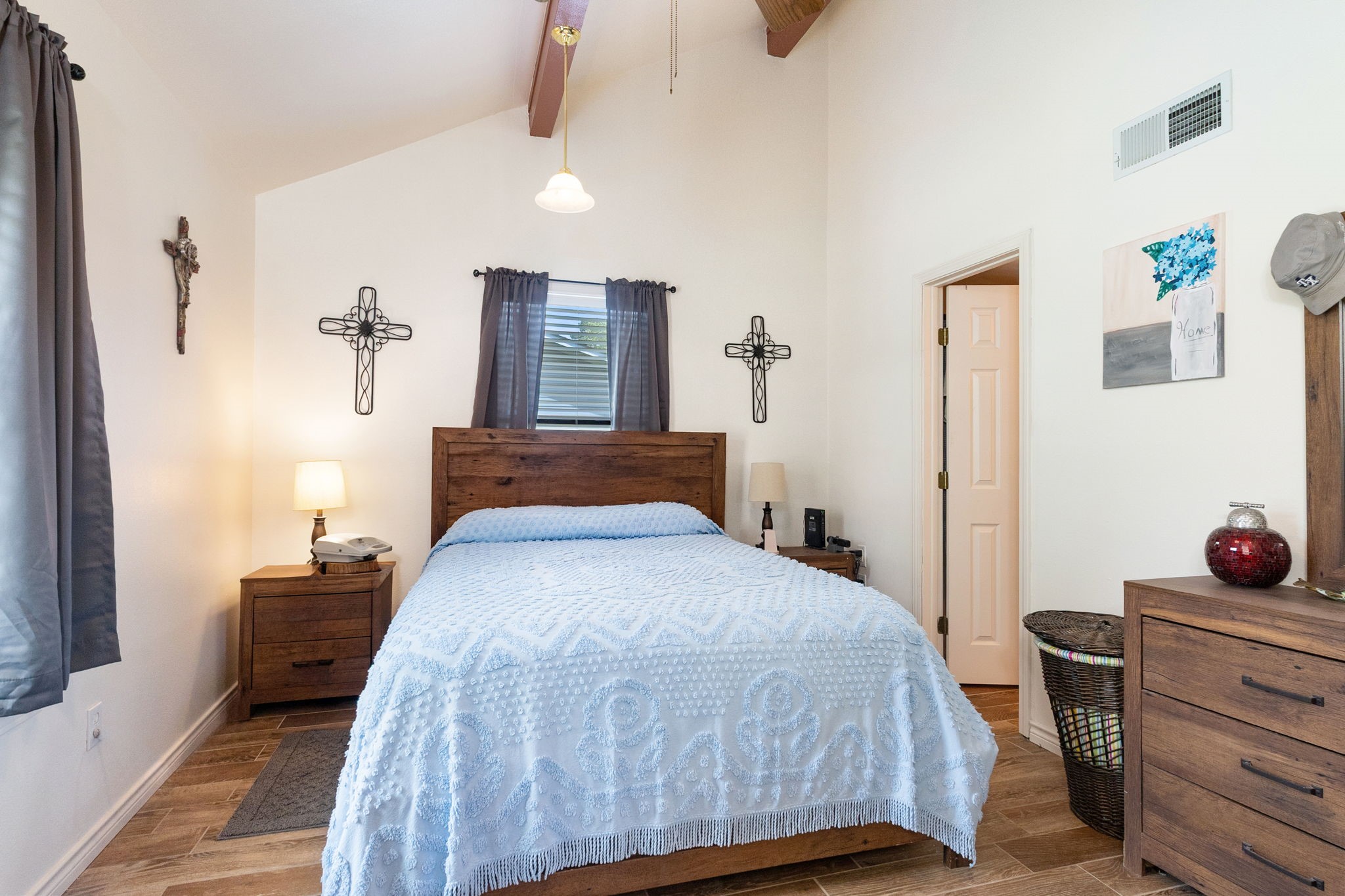 628 County Road 452 Bronson, TX 75930 - Photo 30 of 50 a bedroom with a bed and wooden floor