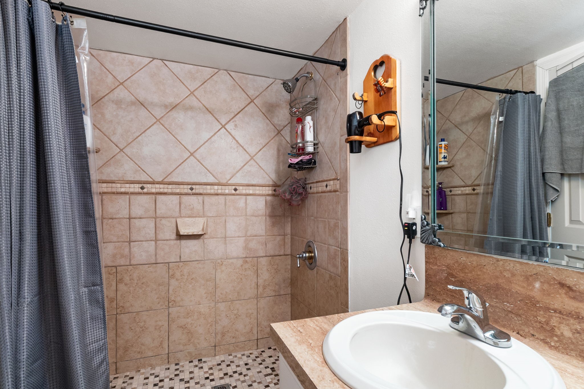 628 County Road 452 Bronson, TX 75930 - Photo 32 of 50 a bathroom with a sink and a mirror