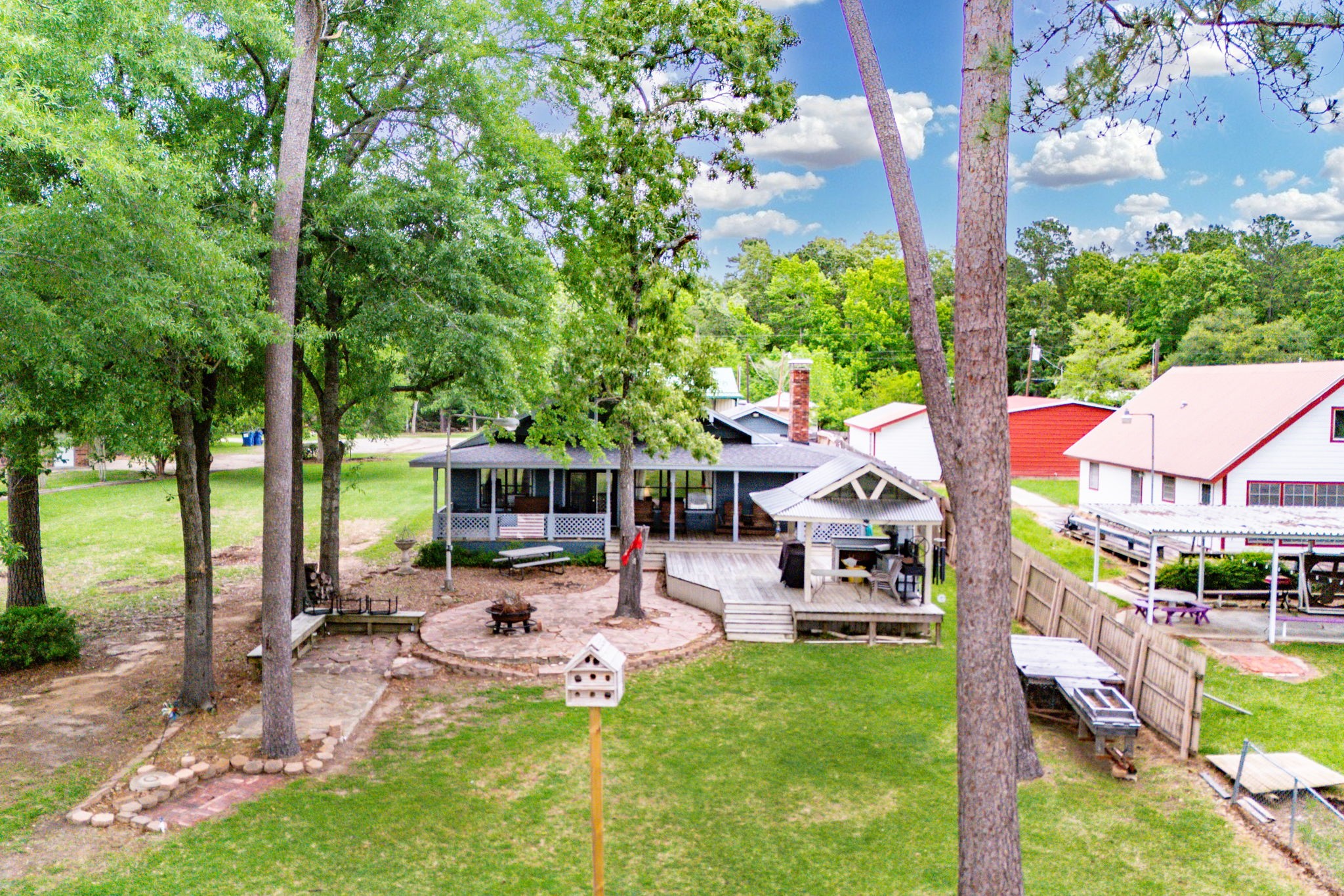 628 County Road 452 Bronson, TX 75930 - Photo 6 of 50 a view of a backyard with sitting area