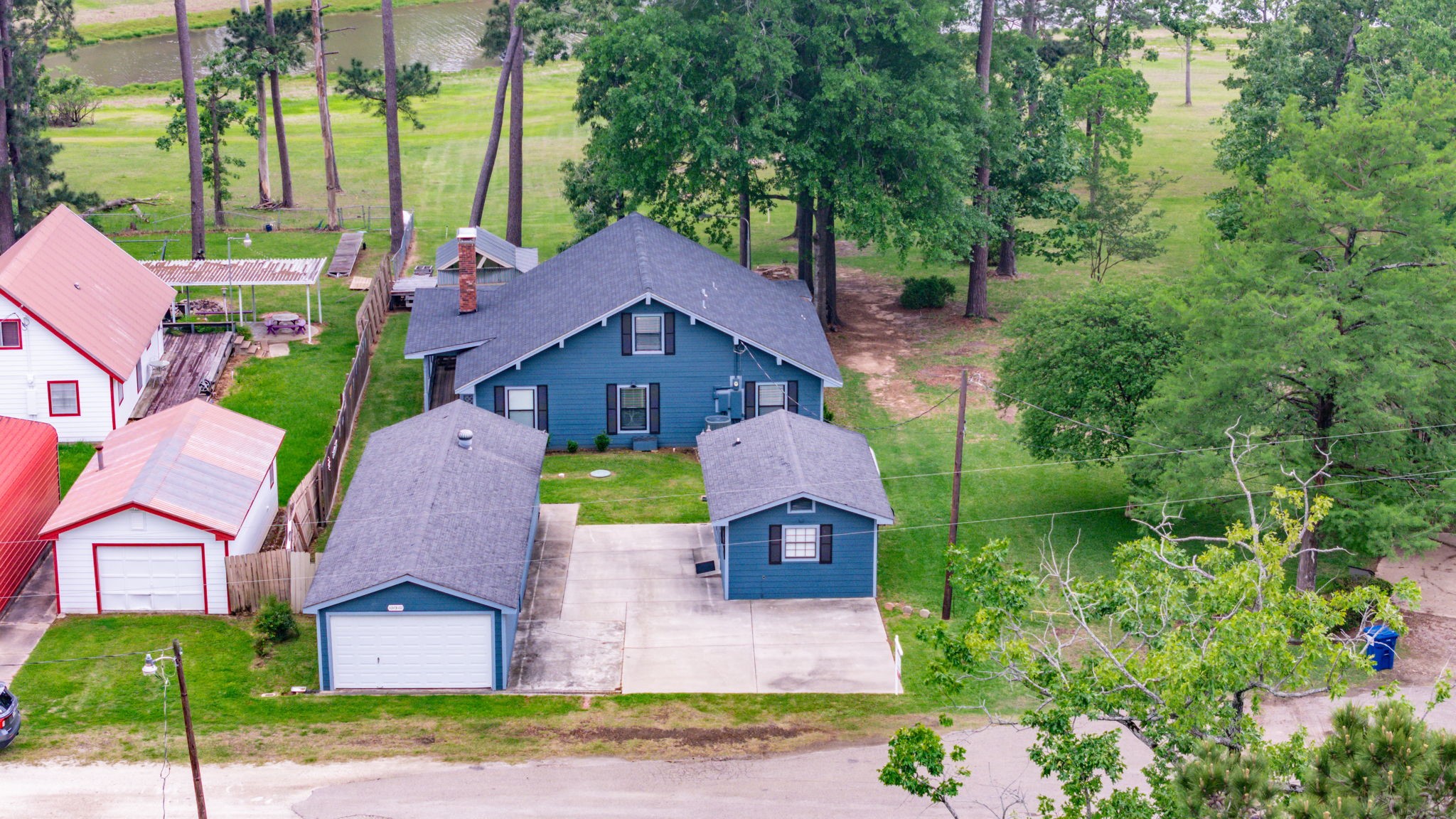 628 County Road 452 Bronson, TX 75930 - Photo 9 of 50 an aerial view of a house
