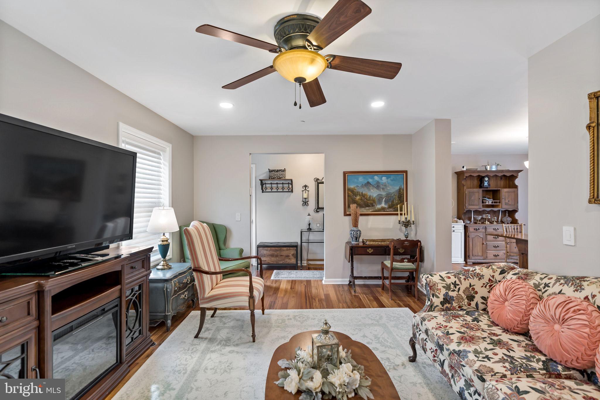 5632 Hines Road Frederick, MD 21704 - Photo 13 of 44 a living room with furniture and a flat screen tv