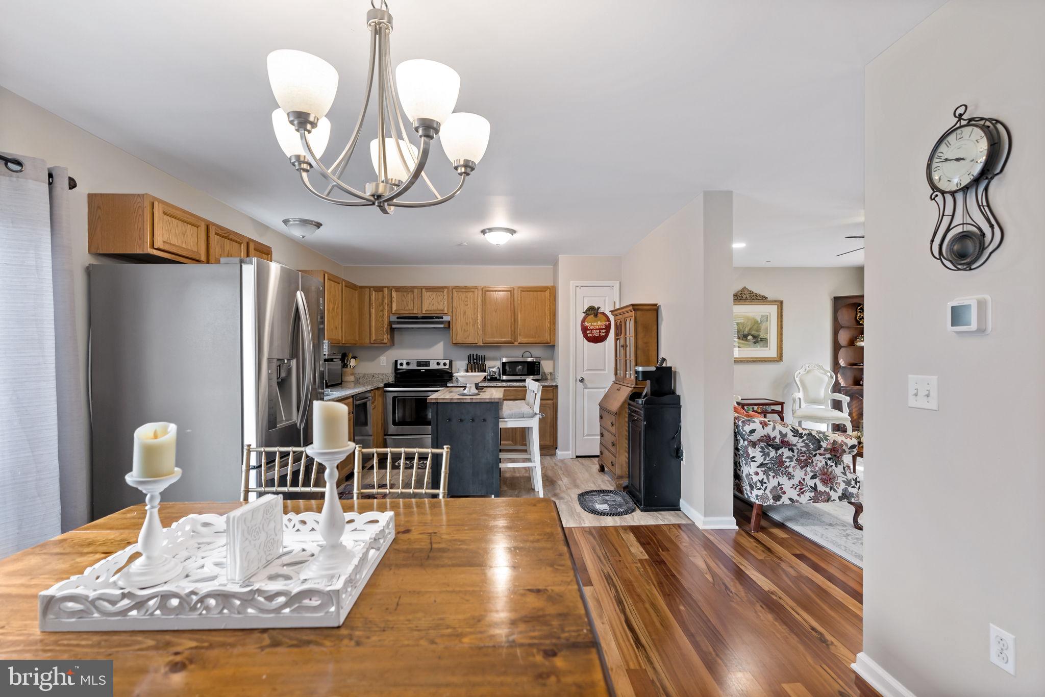 5632 Hines Road Frederick, MD 21704 - Photo 14 of 44 a view of a dining room with furniture
