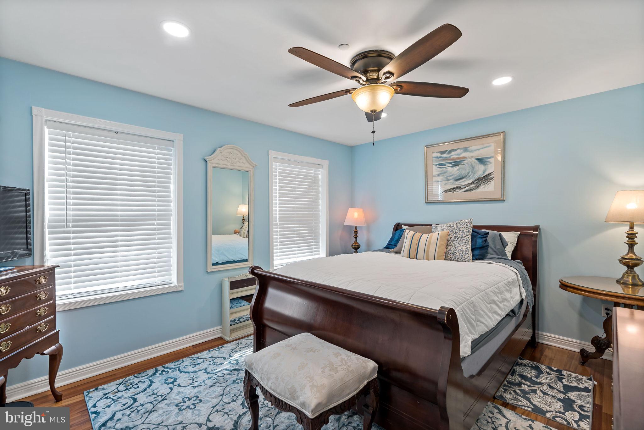5632 Hines Road Frederick, MD 21704 - Photo 20 of 44 a room with a bed a window and a chandelier