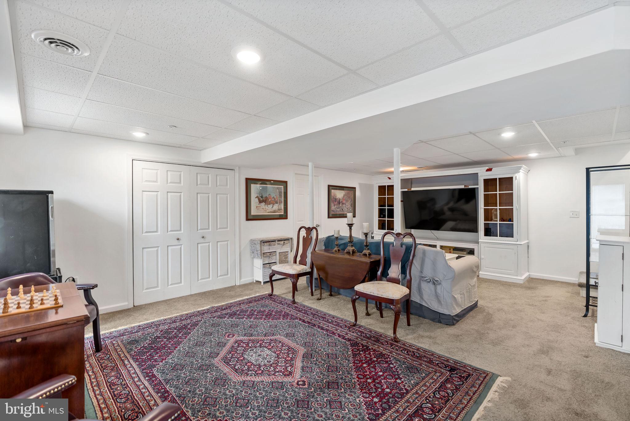 5632 Hines Road Frederick, MD 21704 - Photo 29 of 44 a living room with furniture rug and window