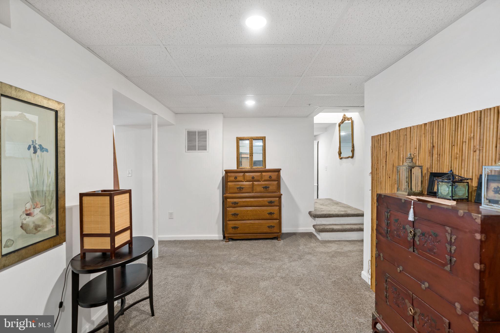5632 Hines Road Frederick, MD 21704 - Photo 32 of 44 a view of a livingroom with furniture and staircase