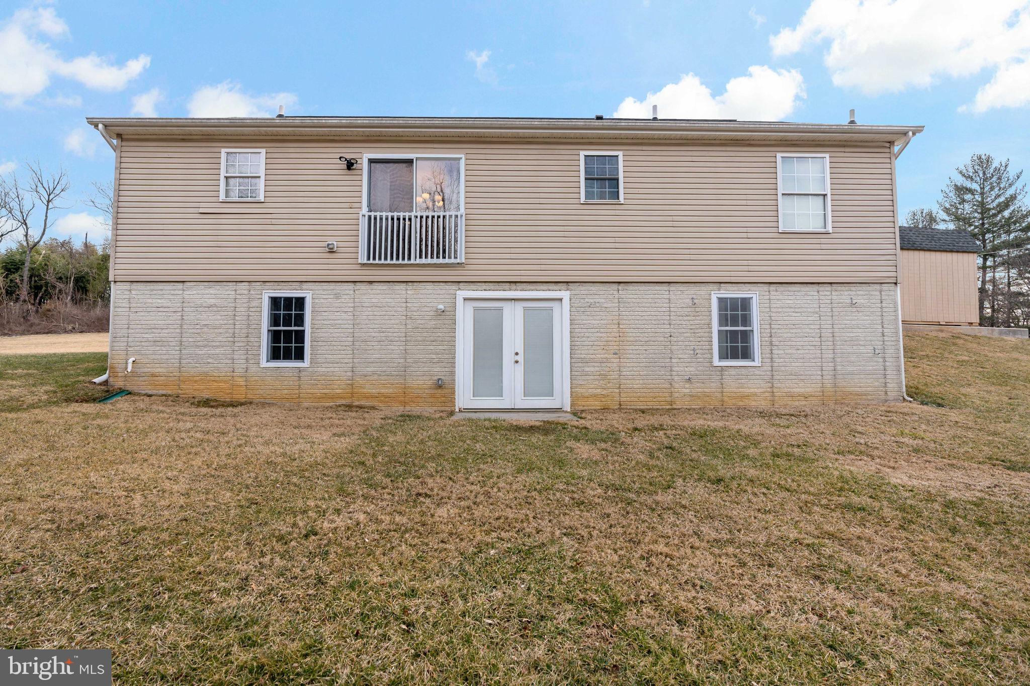 5632 Hines Road Frederick, MD 21704 - Photo 37 of 44 a front view of a house with a garden
