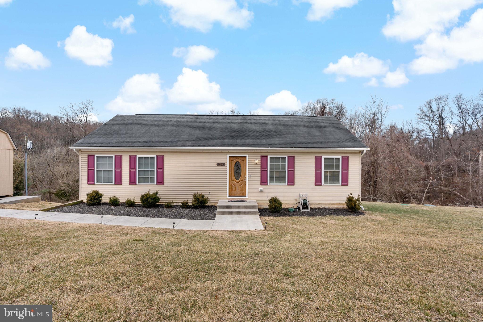 5632 Hines Road Frederick, MD 21704 - Photo 43 of 44 a front view of a house with a yard