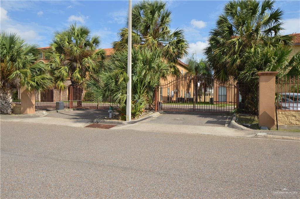 2705 Mimosa Street, Unit 4 Mission, TX 78574 - Photo 11 of 24 a view of street with a building and palm trees