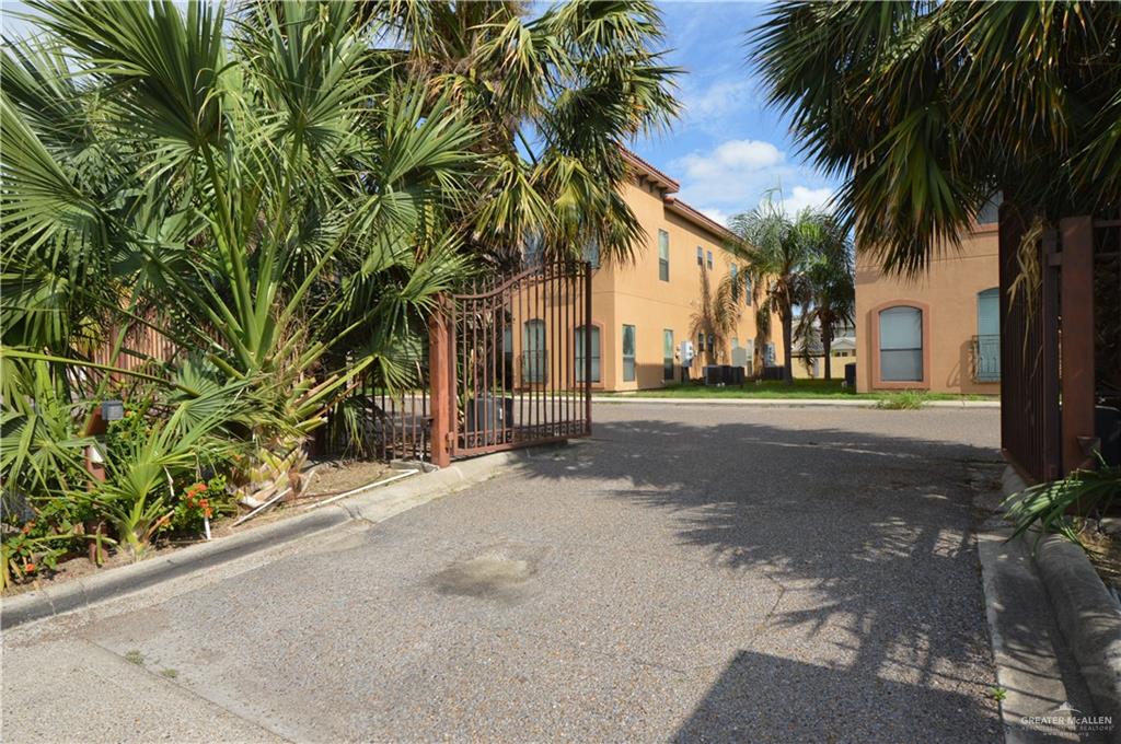 2705 Mimosa Street, Unit 4 Mission, TX 78574 - Photo 12 of 24 a view of a street with palm trees