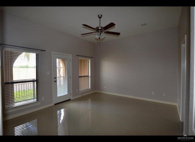 2705 Mimosa Street, Unit 4 Mission, TX 78574 - Photo 3 of 24 a view of an empty room with a window