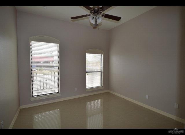2705 Mimosa Street, Unit 4 Mission, TX 78574 - Photo 9 of 24 a view of an empty room with a window