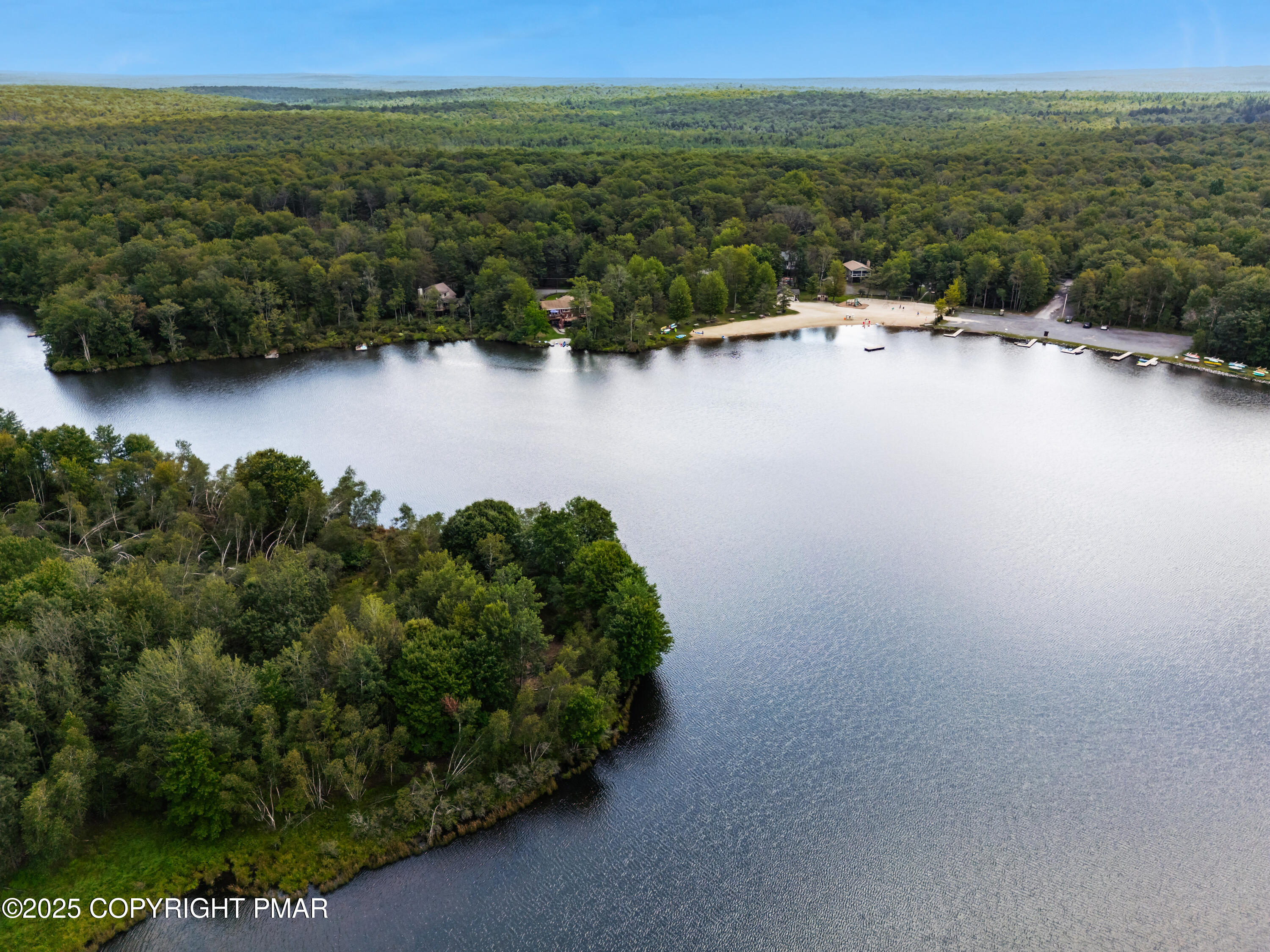 804 Evergreen Road Pocono Lake, PA 18347 - Photo 15 of 19 an aerial view of a houses with a yard and lake view