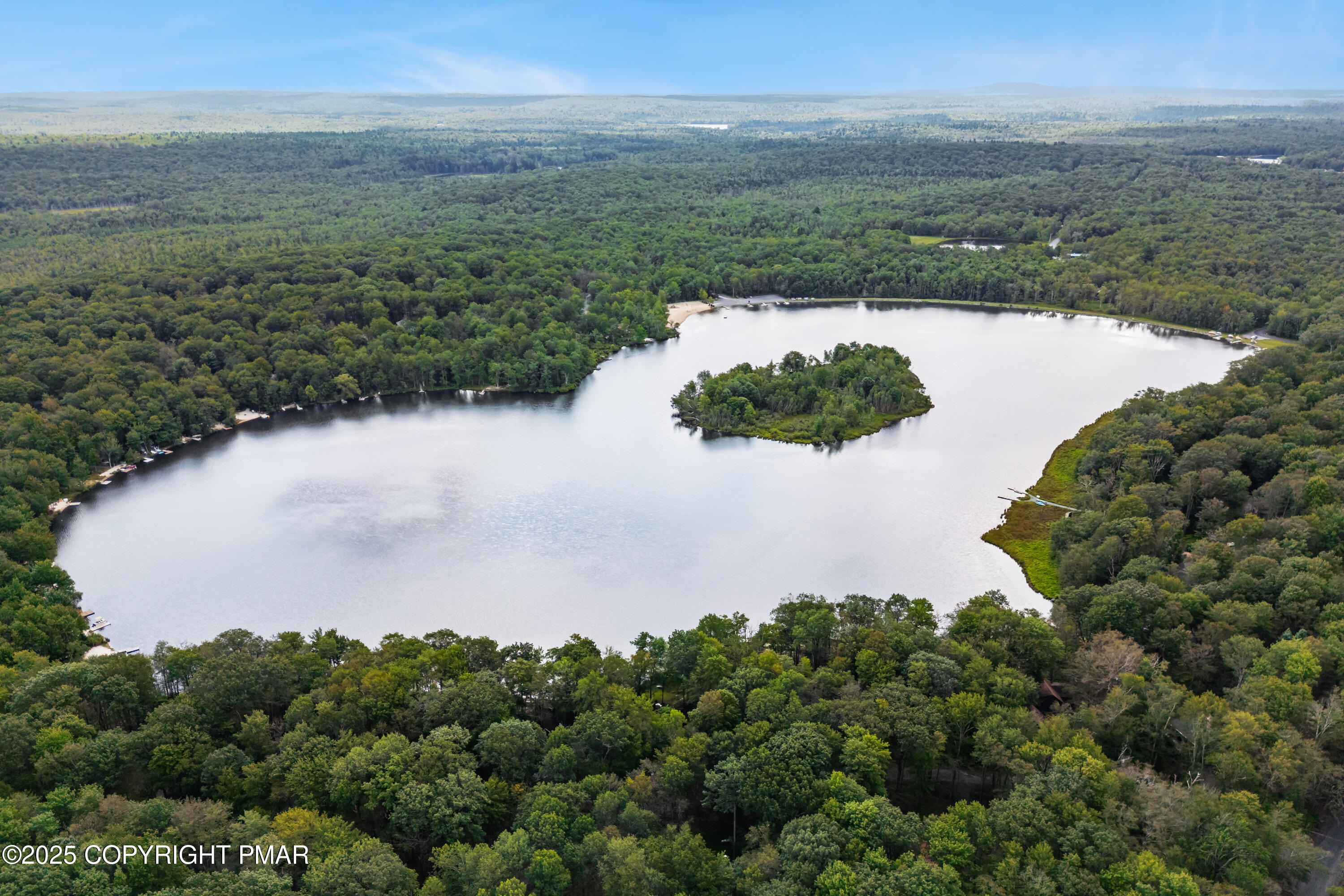 804 Evergreen Road Pocono Lake, PA 18347 - Photo 16 of 19 a view of a lake and green valley
