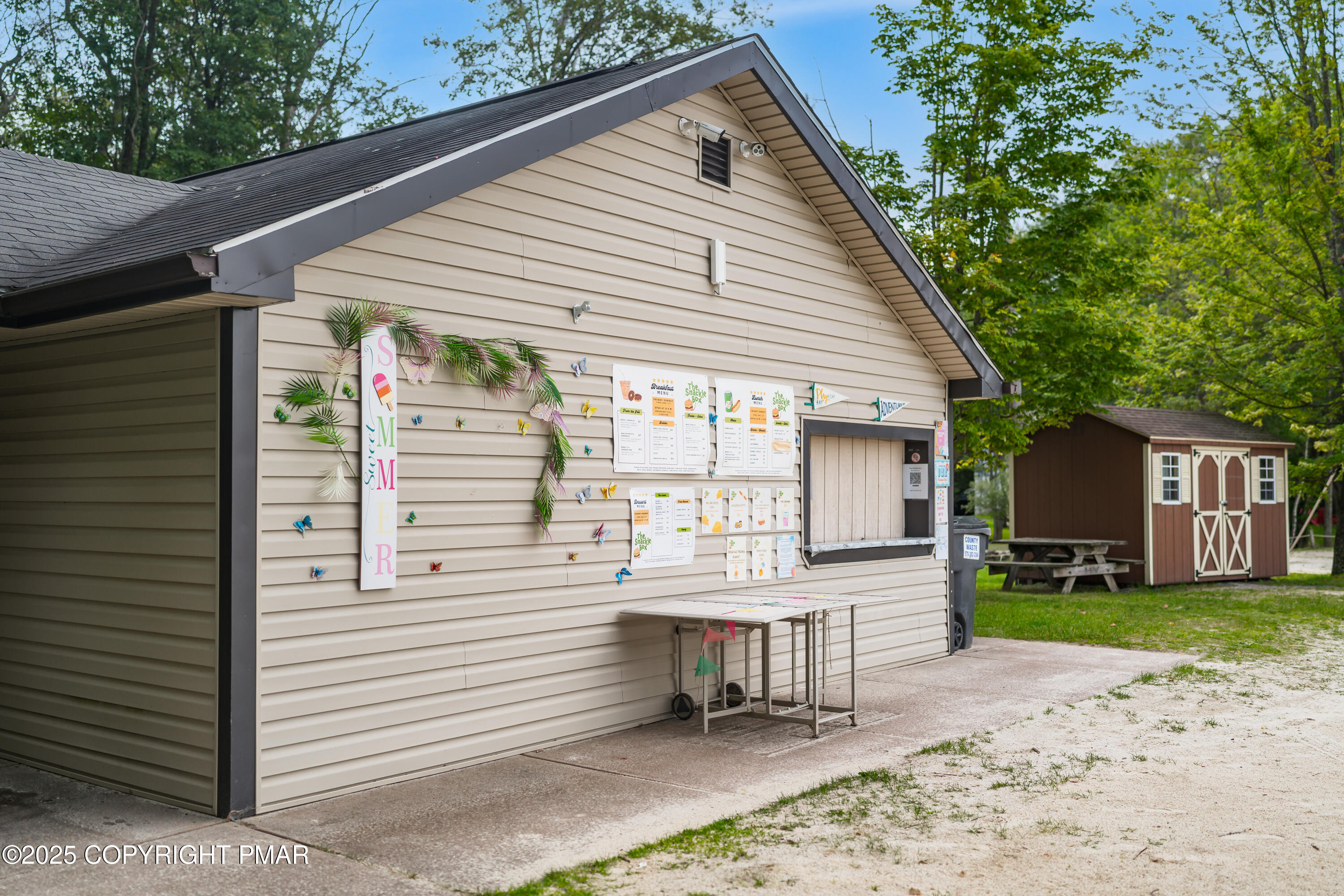 804 Evergreen Road Pocono Lake, PA 18347 - Photo 19 of 19 a view of a house with a chairs in patio