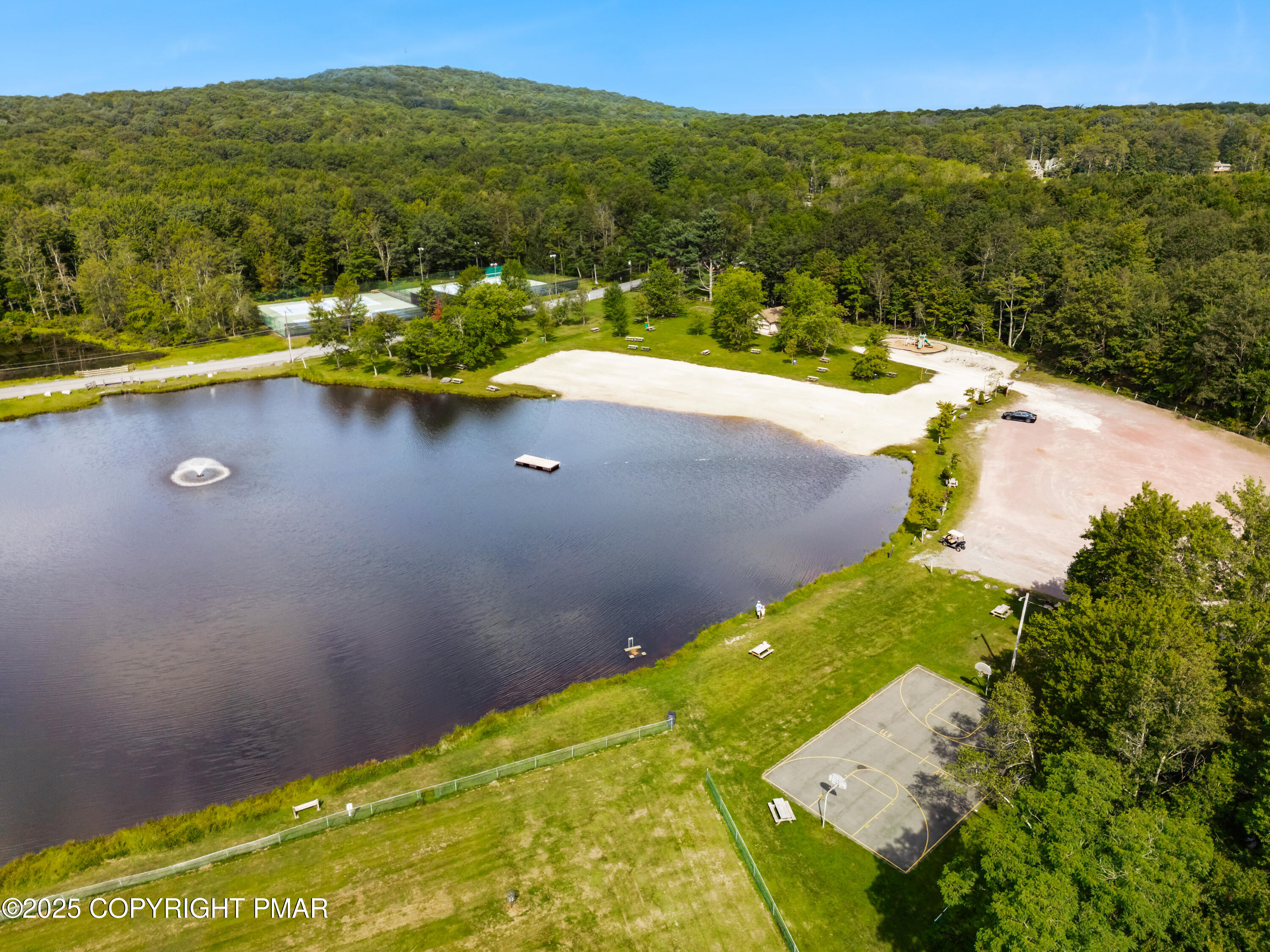 804 Evergreen Road Pocono Lake, PA 18347 - Photo 6 of 19 a view of a lake with a yard