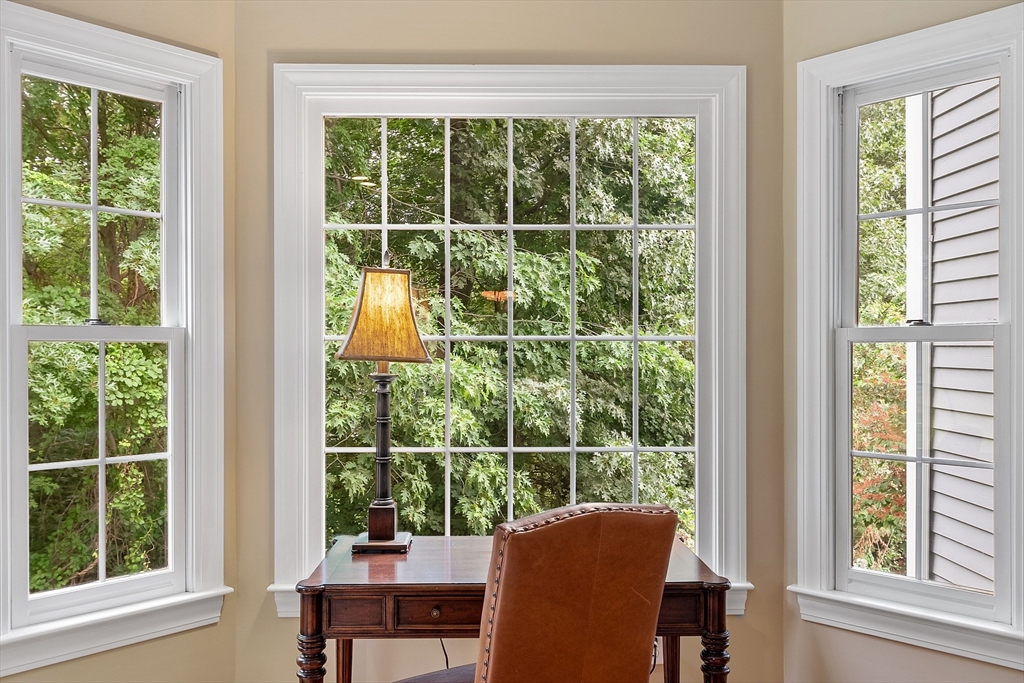 3 Coderre Way Andover, MA 01810 - Photo 19 of 42 a view of a room with balcony and furniture