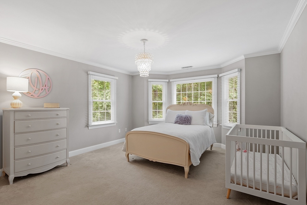 3 Coderre Way Andover, MA 01810 - Photo 30 of 42 a bedroom with a bed a window and dresser