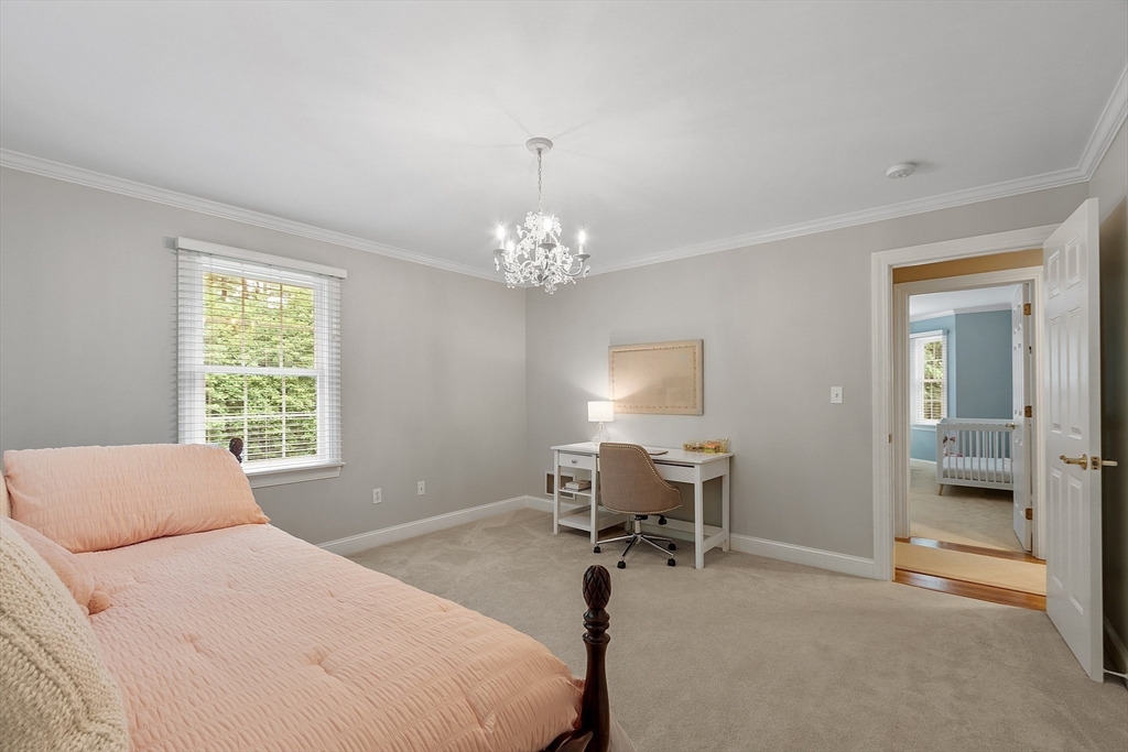 3 Coderre Way Andover, MA 01810 - Photo 33 of 42 a bedroom with a bed and a table chair
