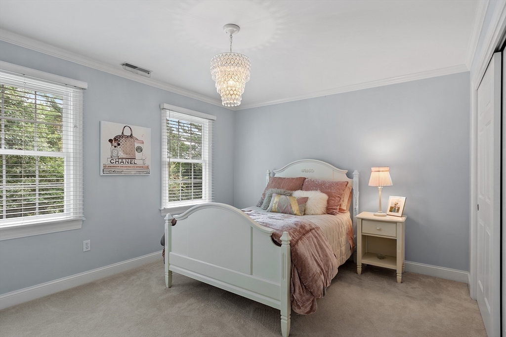 3 Coderre Way Andover, MA 01810 - Photo 35 of 42 a bedroom with a bed and a window
