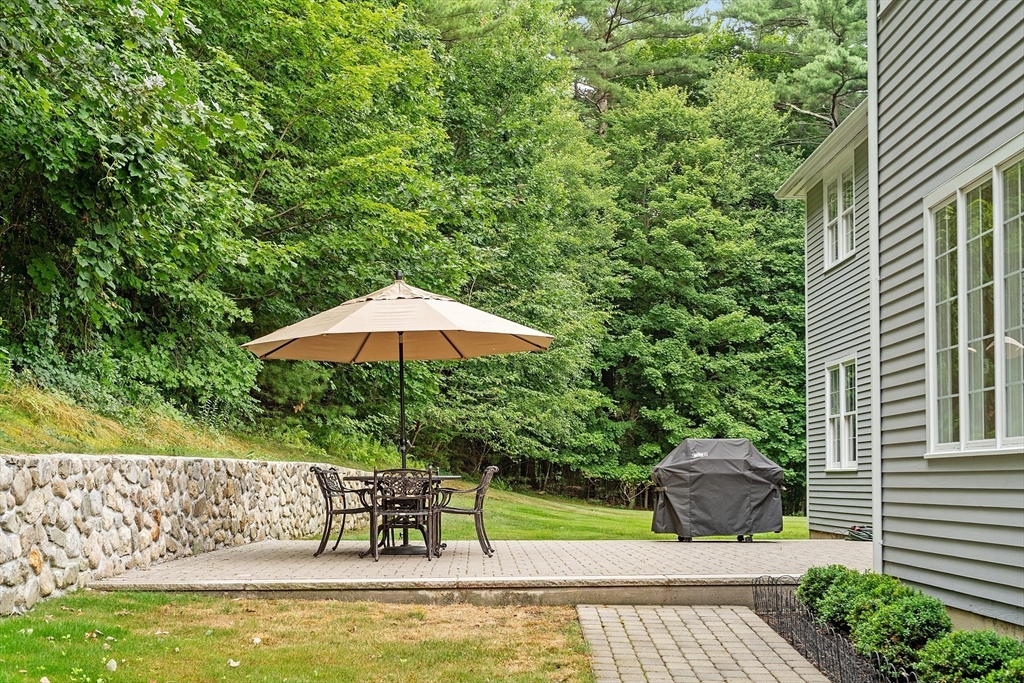 3 Coderre Way Andover, MA 01810 - Photo 41 of 42 a view of a swimming pool with a patio