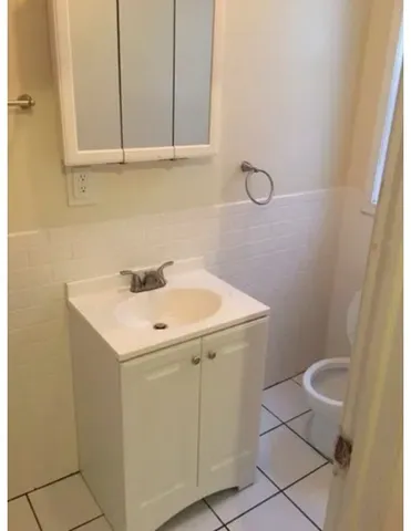 a view of bathroom with a sink and a toilet