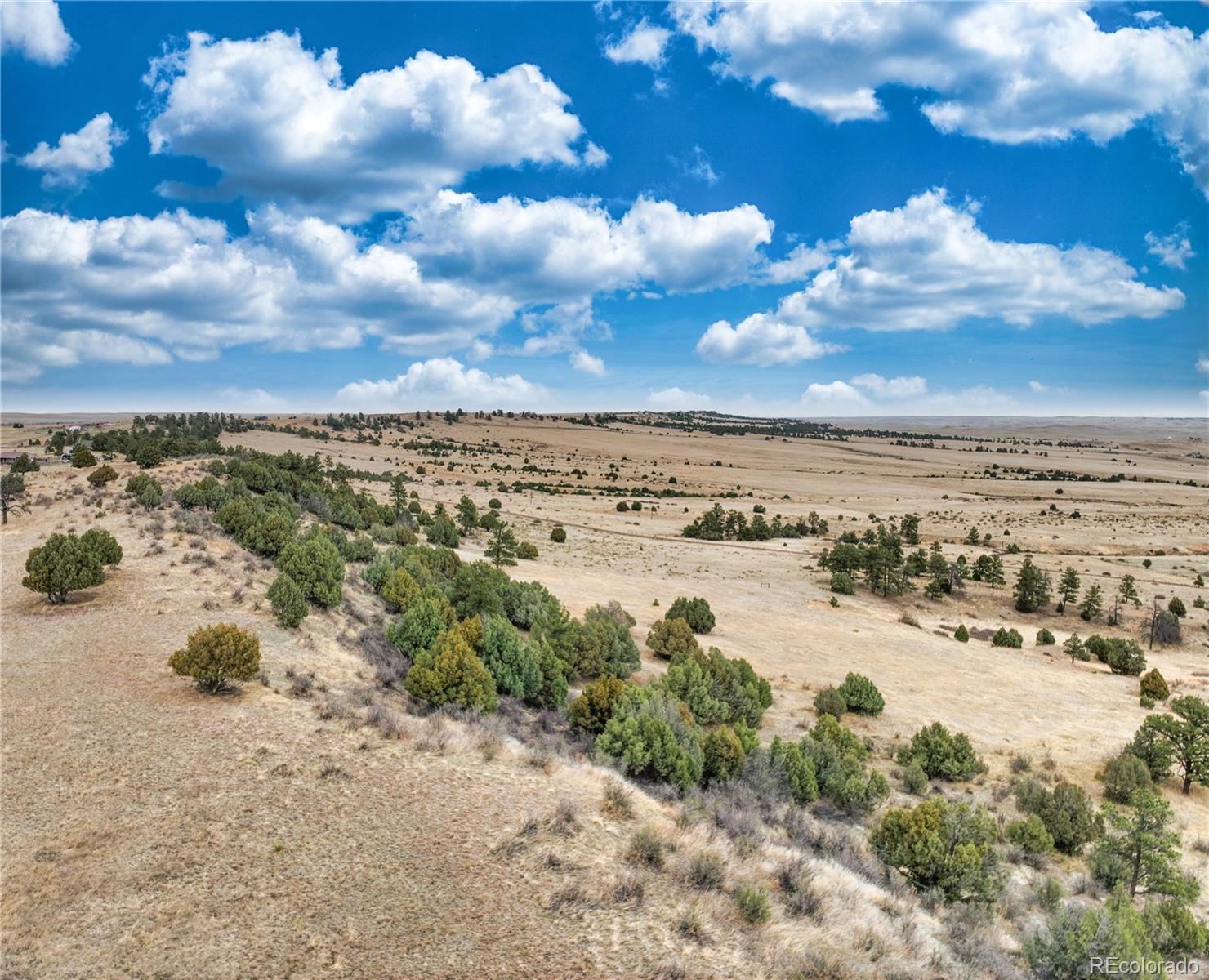 35584 Comanche Creek Road Kiowa, CO 80117 - Photo 13 of 15 a view of a lake with beach