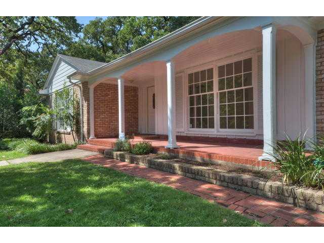 4204 Lullwood Road Austin, TX 78722 - Photo 1 of 1 a front view of a house with a yard