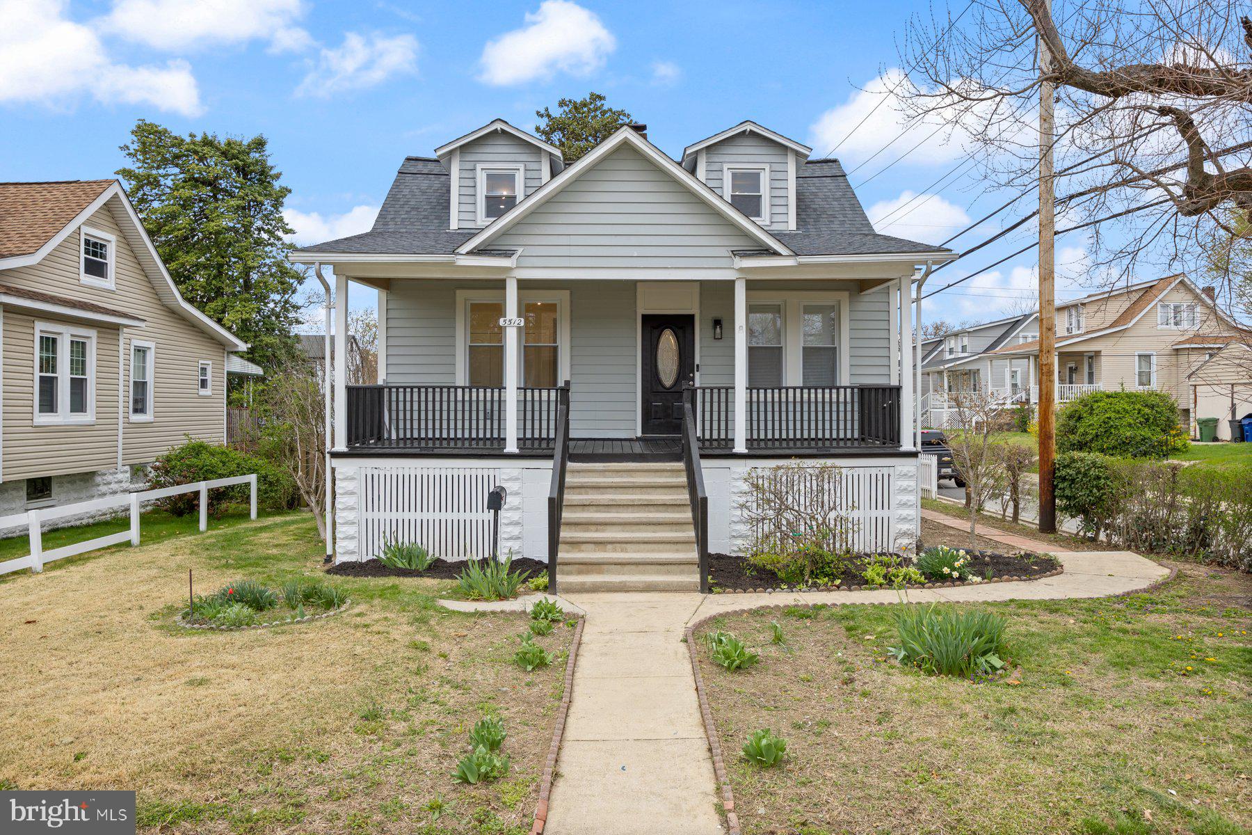 5512 Tramore Road Baltimore, MD 21214 - Photo 1 of 37 front view of a house with a porch