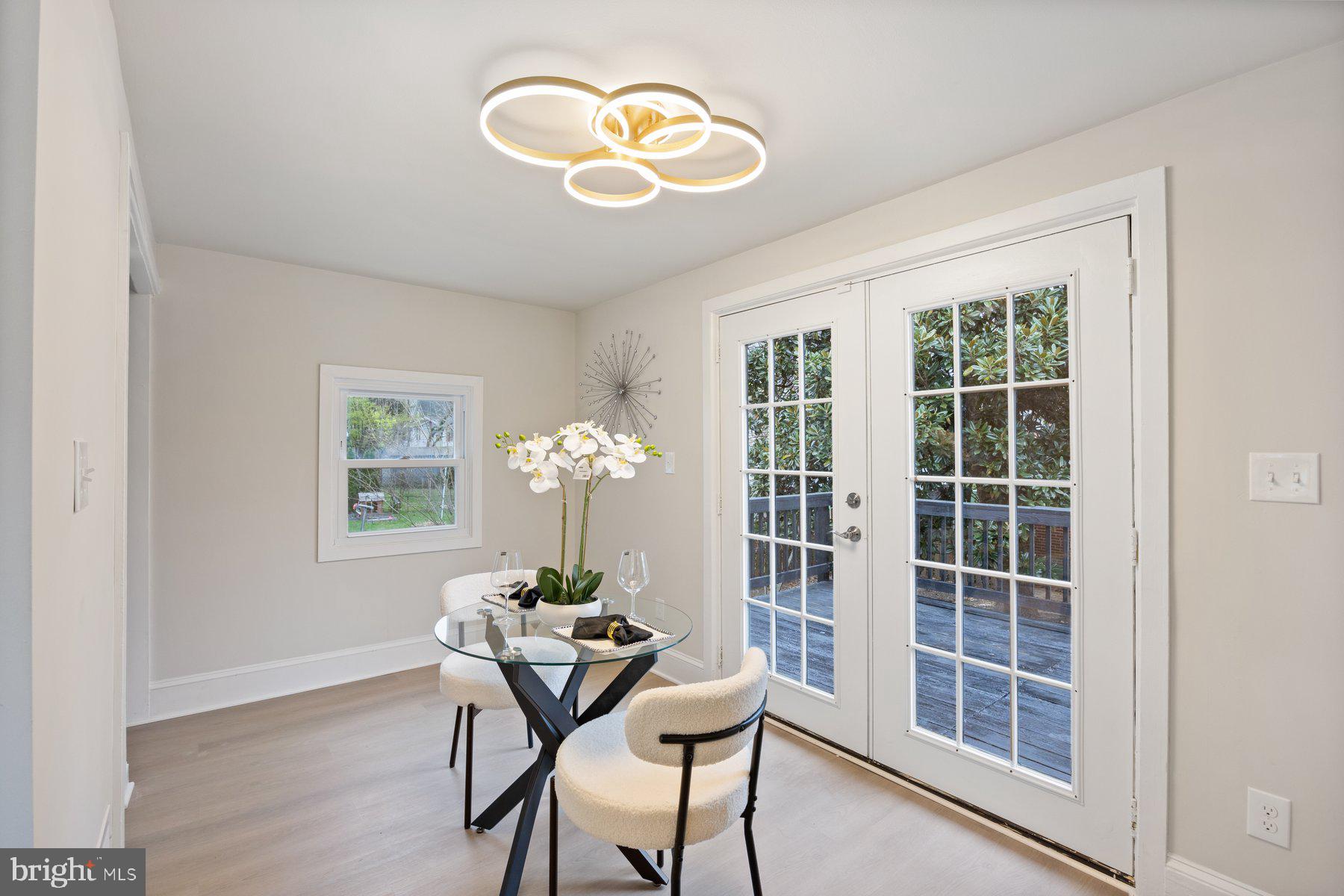 5512 Tramore Road Baltimore, MD 21214 - Photo 14 of 37 a view of a dining room with furniture window and outside view