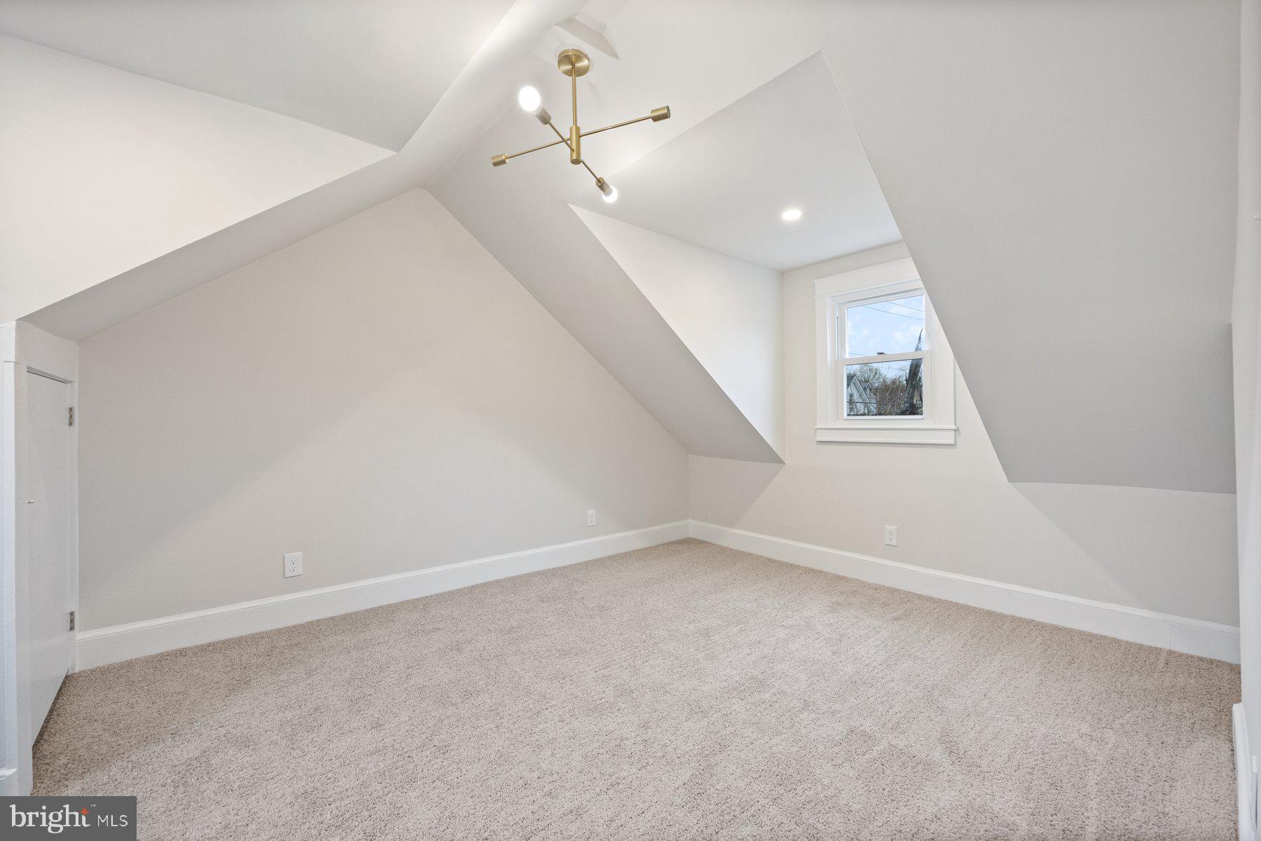 5512 Tramore Road Baltimore, MD 21214 - Photo 23 of 37 wooden floor in an empty room with a window