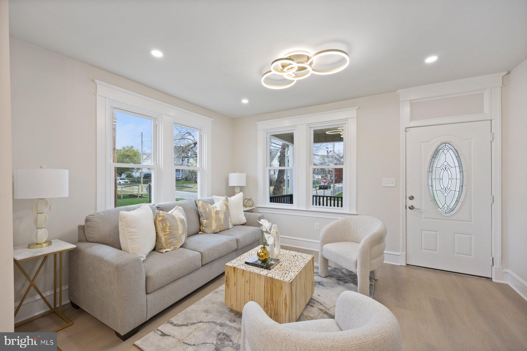 5512 Tramore Road Baltimore, MD 21214 - Photo 5 of 37 a living room with furniture and a large window