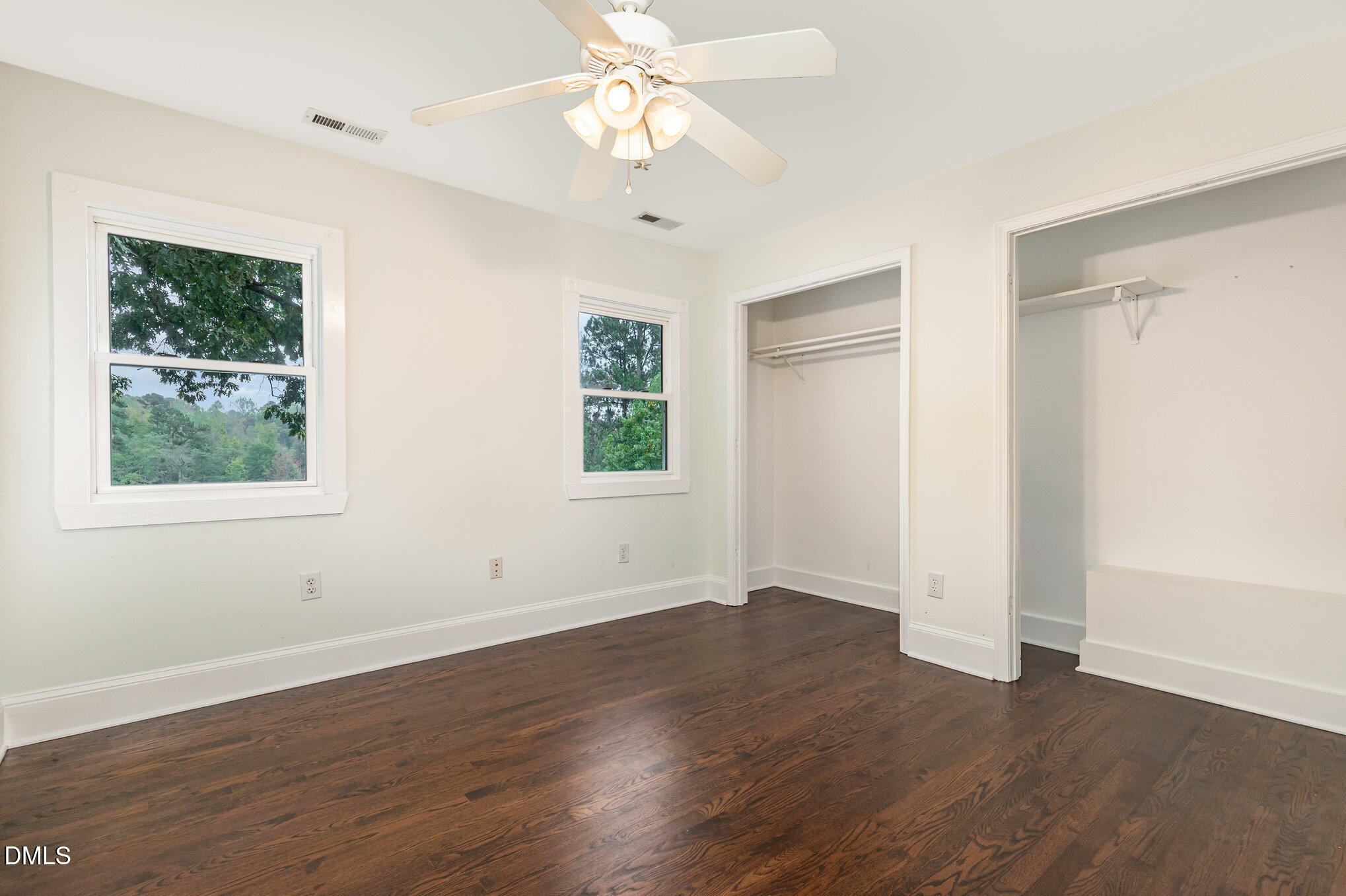 9261 Blackley Lake Road Wake Forest, NC 27587 - Photo 24 of 41 a view of an empty room with wooden floor and a window