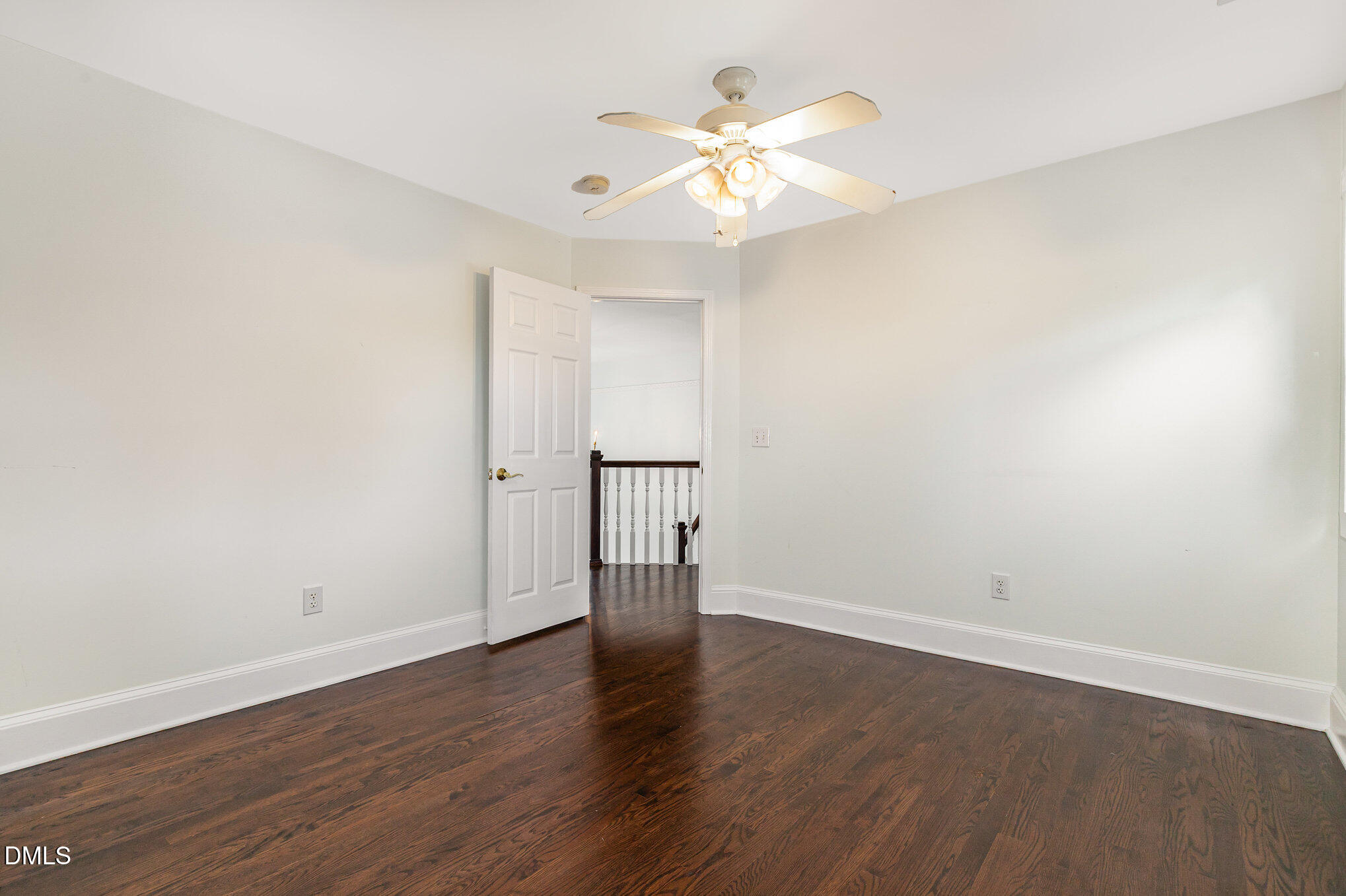 9261 Blackley Lake Road Wake Forest, NC 27587 - Photo 25 of 41 a view of an empty room with wooden floor
