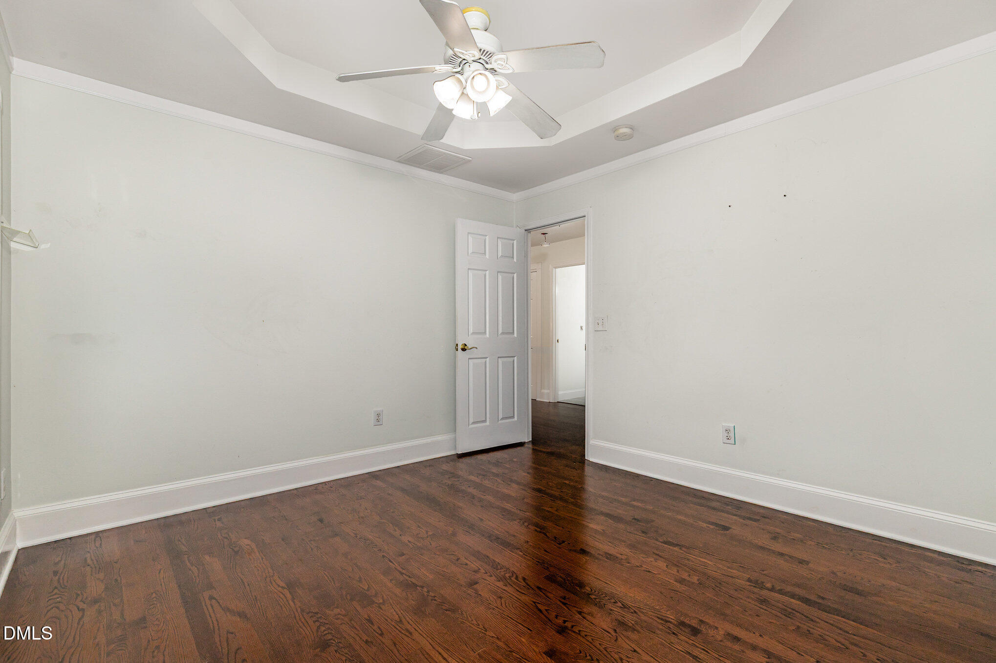 9261 Blackley Lake Road Wake Forest, NC 27587 - Photo 28 of 41 a view of an empty room with wooden floor