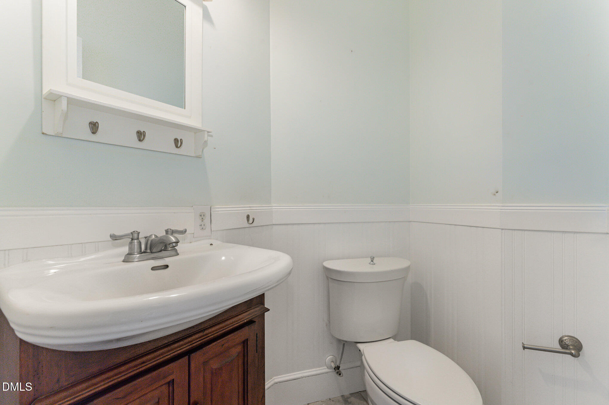 9261 Blackley Lake Road Wake Forest, NC 27587 - Photo 31 of 41 a bathroom with a sink and a toilet