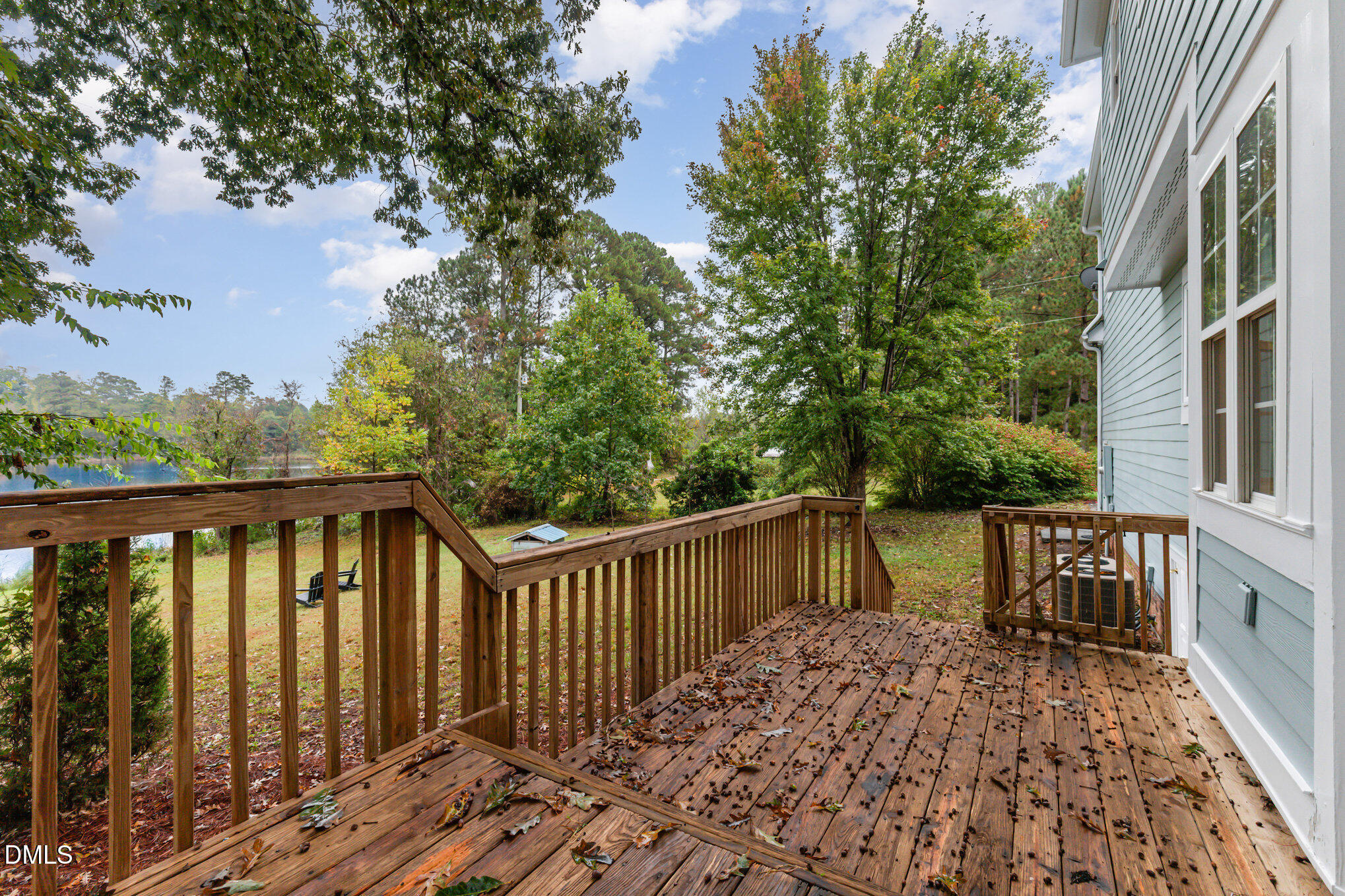9261 Blackley Lake Road Wake Forest, NC 27587 - Photo 32 of 41 a balcony with wooden floor and fence
