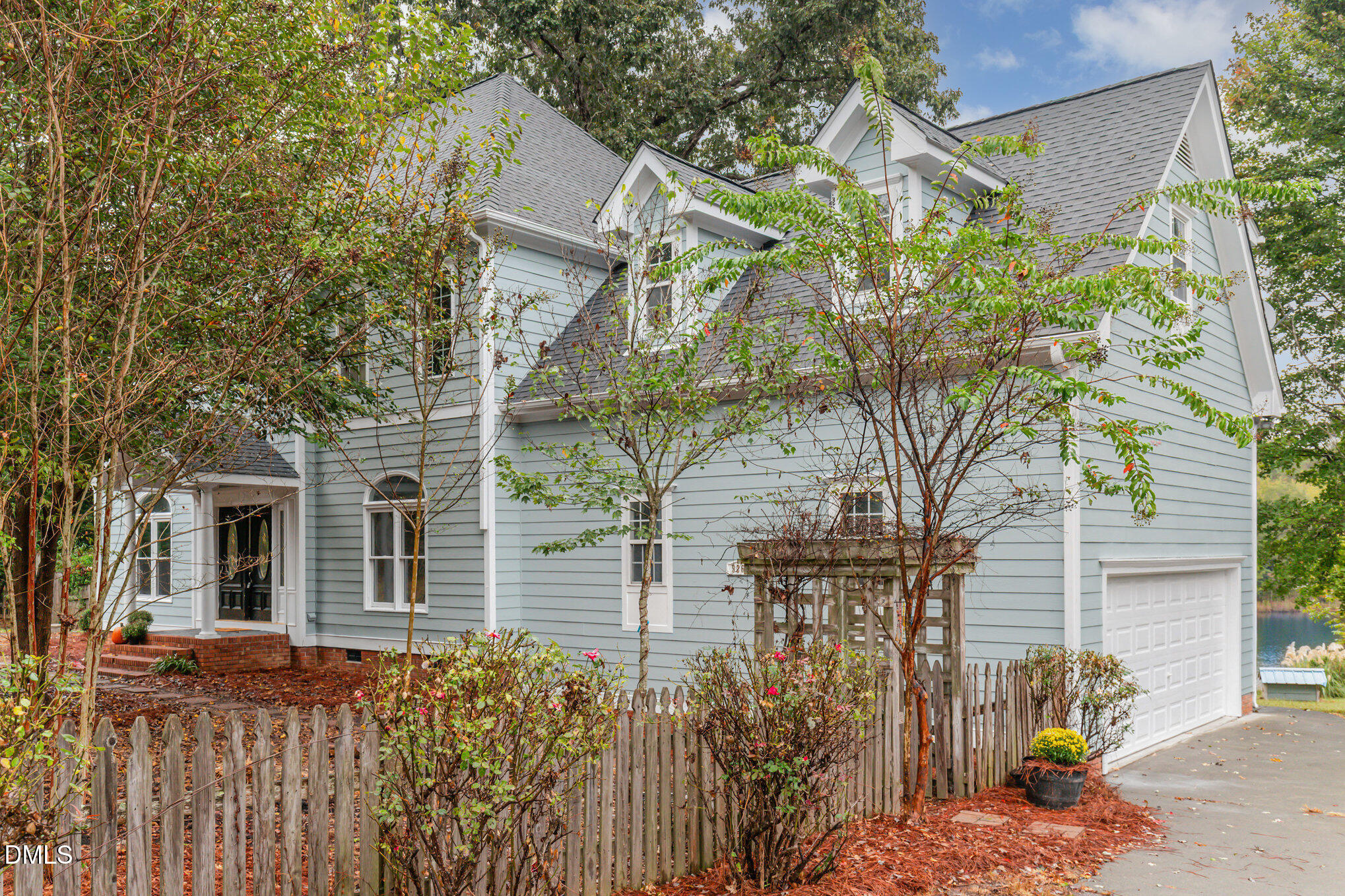9261 Blackley Lake Road Wake Forest, NC 27587 - Photo 6 of 41 front view of a house with a tree
