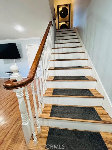 7304 Exeter Street, Unit E Paramount, CA 90723 - Photo 13 of 36 Hardwood-capped staircase.