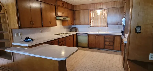 a room with furniture and a flat screen tv