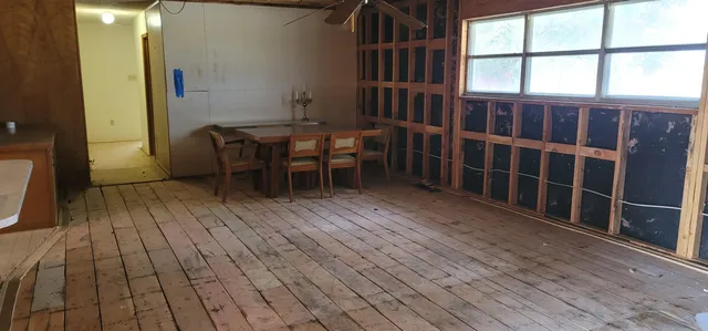 a room with closet and wooden floor