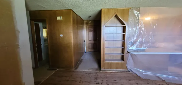 a bathroom with a sink vanity and a mirror