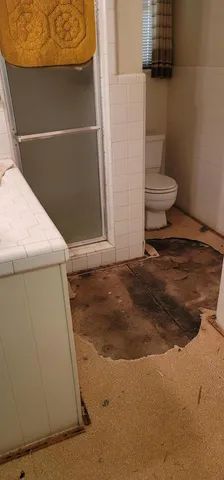 a bathroom with a mirror