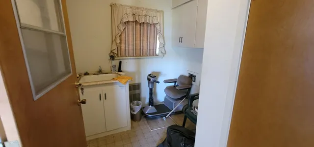 a view of a field with an trees