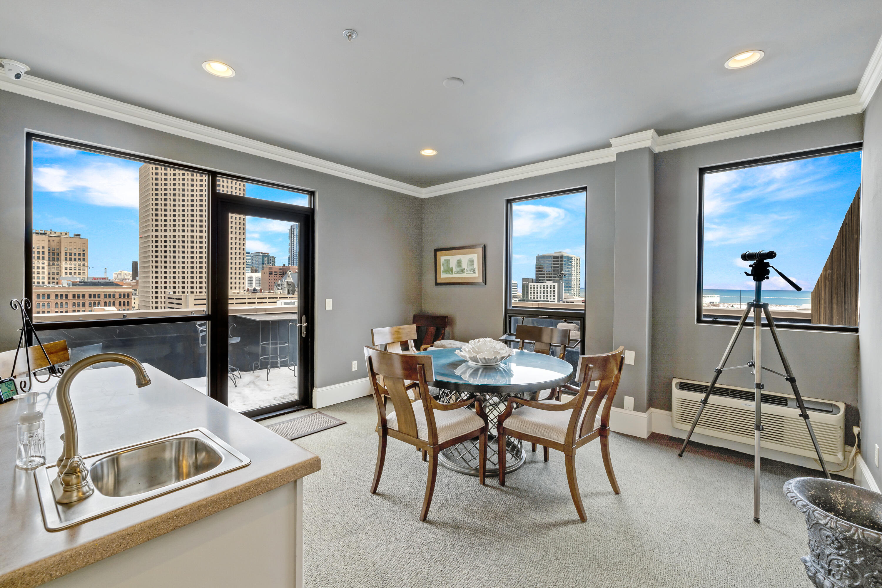 400 North Broadway, Unit 903 Milwaukee, WI 53202 - Photo 13 of 18 Shared Rooftop Common Room & Deck