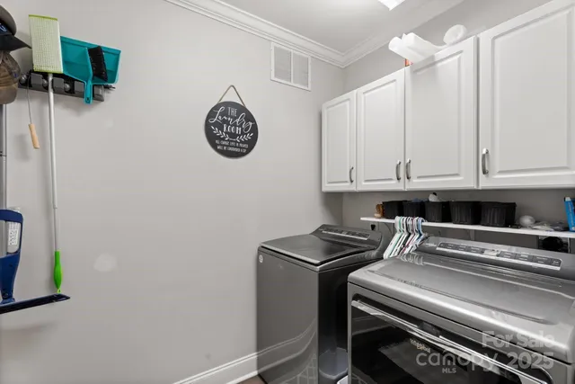 a bed room with a bed and a mirror