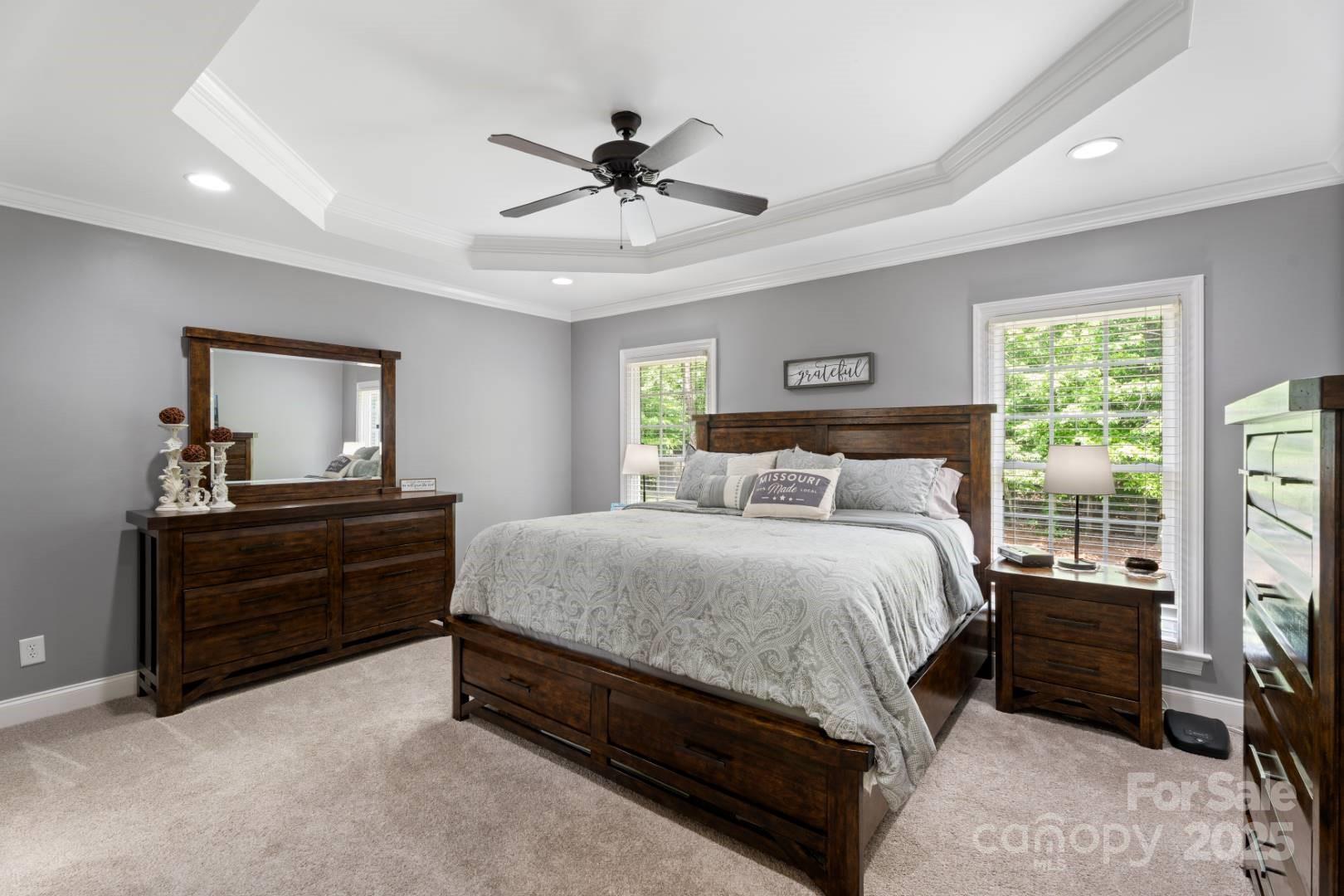 153 Canyon Road Mocksville, NC 27028 - Photo 24 of 46 a bed room with a bed and a mirror