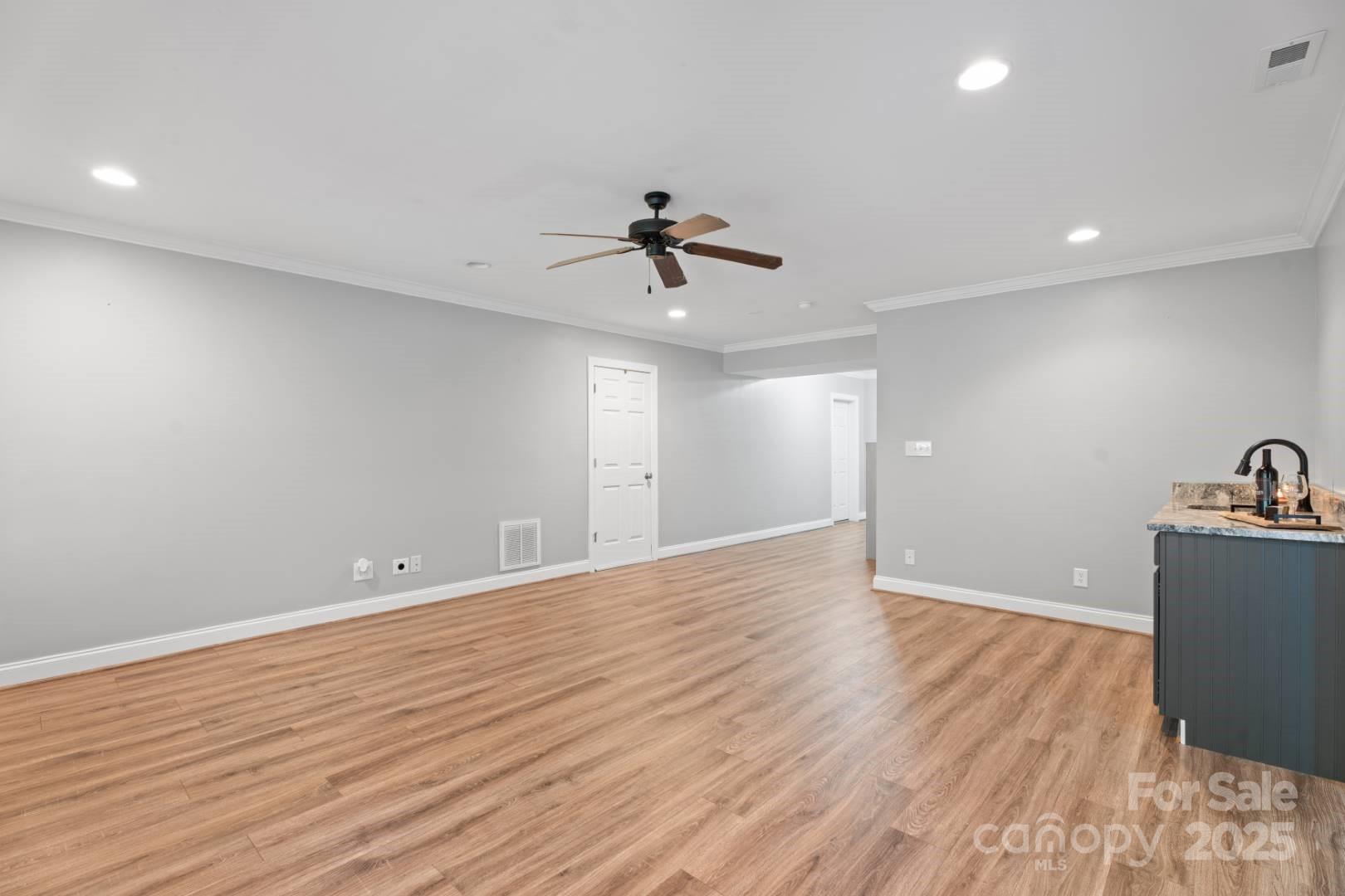 153 Canyon Road Mocksville, NC 27028 - Photo 40 of 46 wooden floor in an empty room with a window