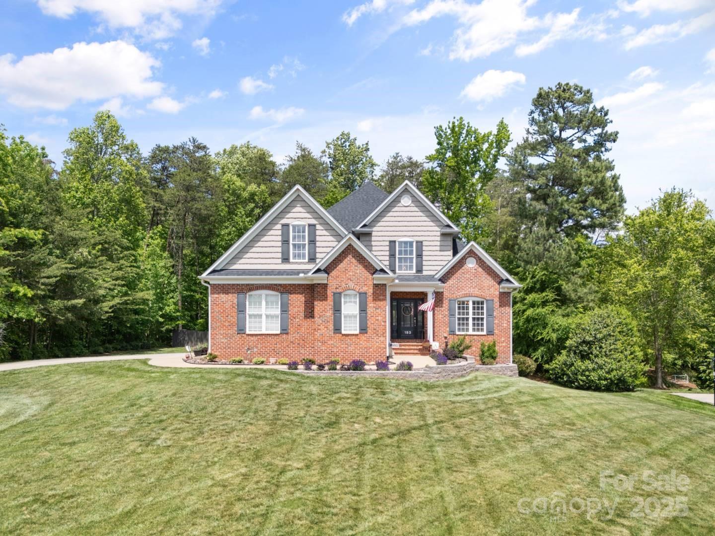 153 Canyon Road Mocksville, NC 27028 - Photo 46 of 46 a front view of a house with yard