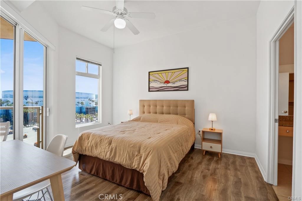 a bedroom with a bed and a table