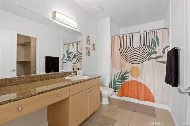 a bathroom with a sink a mirror and a bathtub